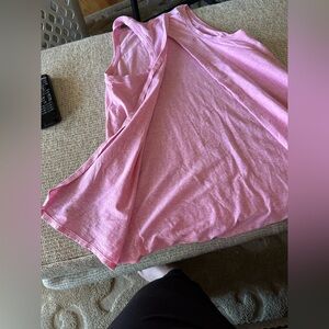 Lululemon open back tank. Size 4In like new condition. Barely worn. Pink